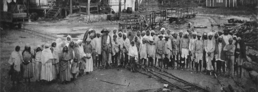 Photograph of indentured Indian labourers at Spring Garden Buildings. Jamaica, 1880. Catalogue reference: CO 137/497/29 folio 519