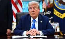 De Amerikaanse president Donald Trump in de Oval Office. Foto: AFP